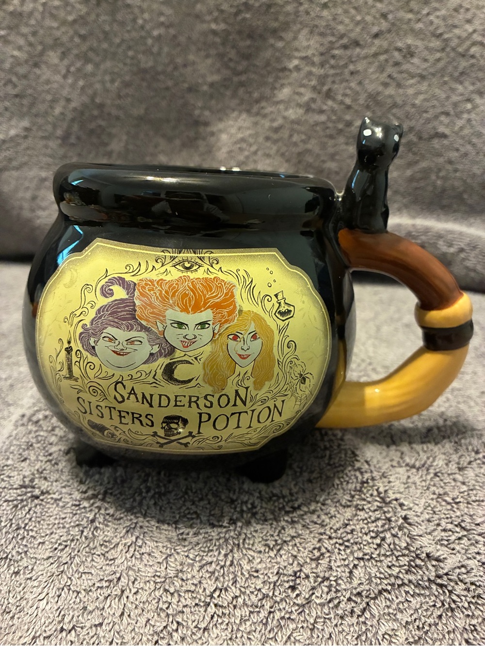 Disney Black Cauldron Mug with Yellow Handle